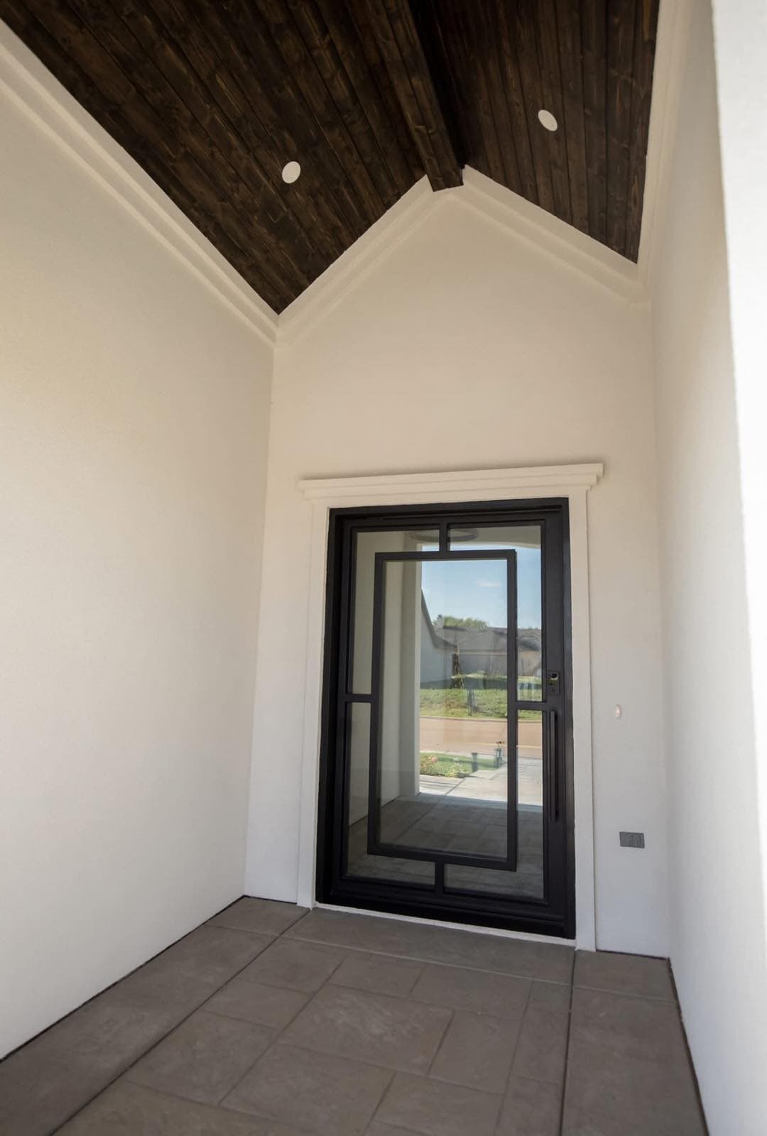 Custom iron entry door installation