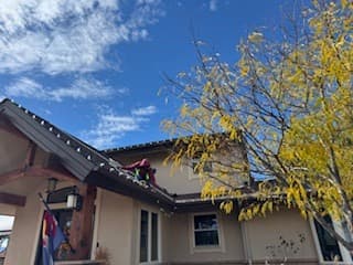 Glowmigos crew on a residential roofing job in Castle Rock